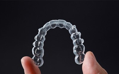 Close-up of an aligner for Invisalign in Wayland, MA